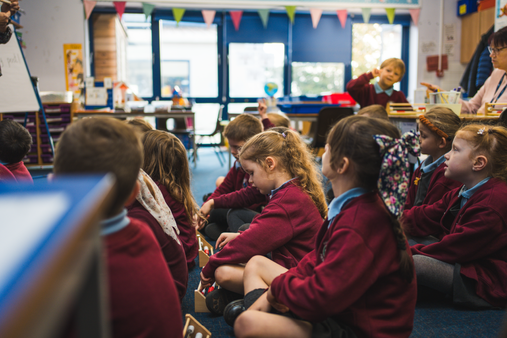 Pupils learning maths with abacus