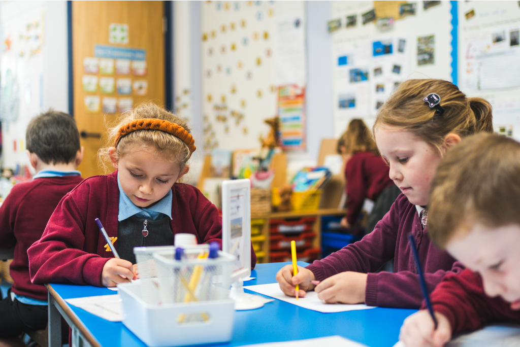 group of pupils writing group of pupils writing