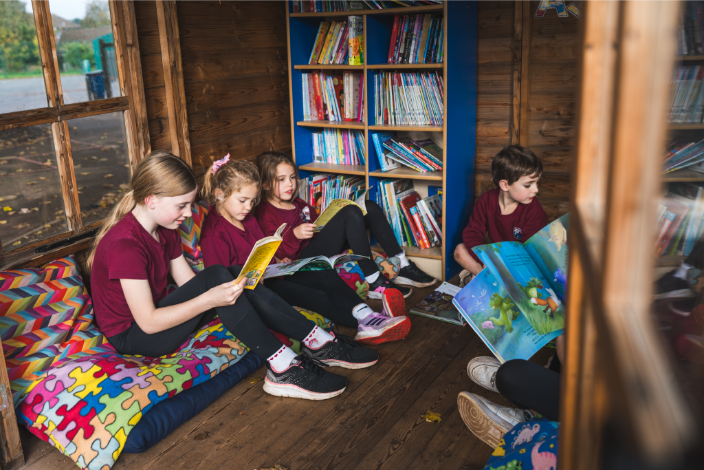 Year 3/4 pupils reading