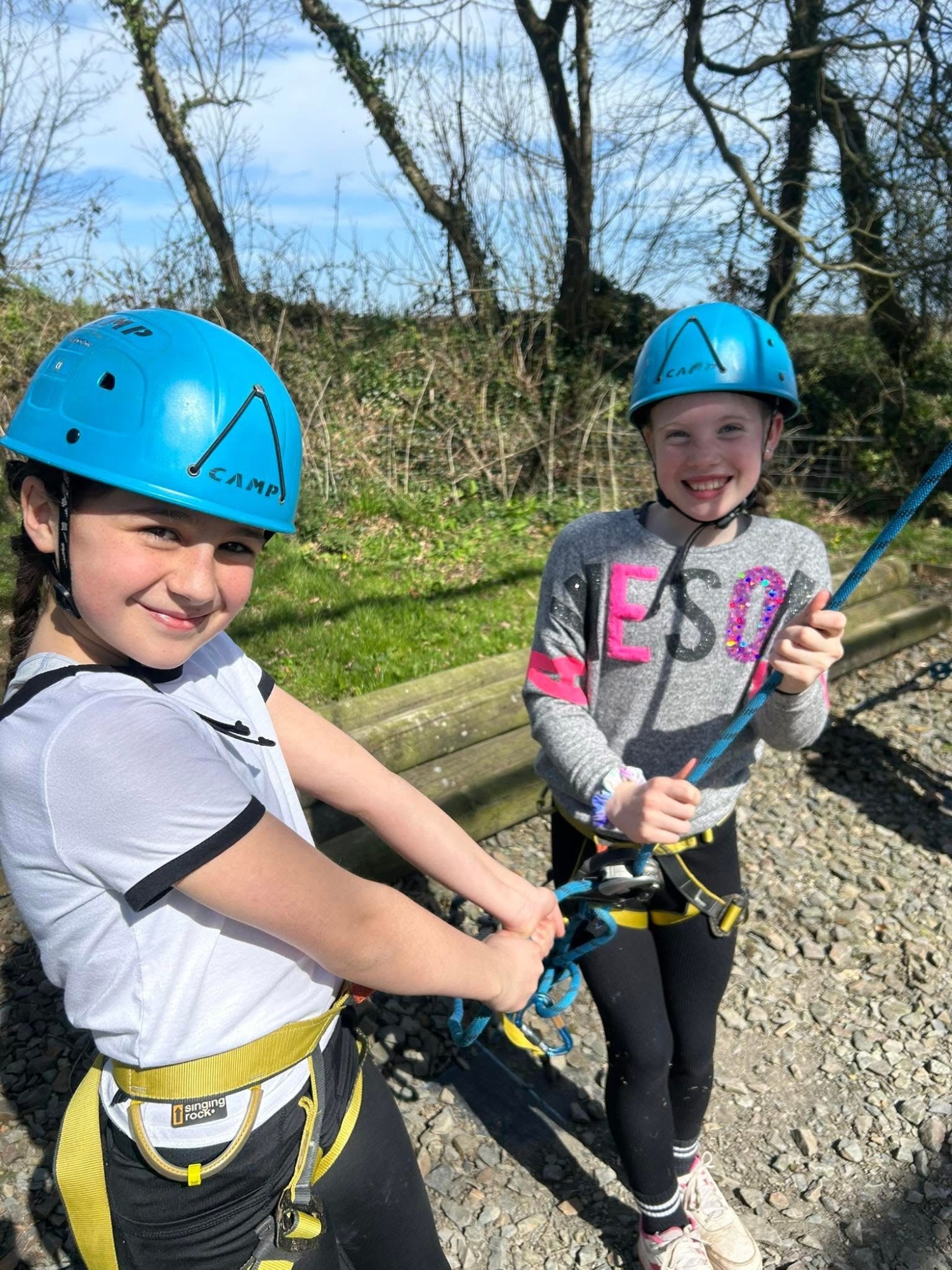 girls with protective helmets