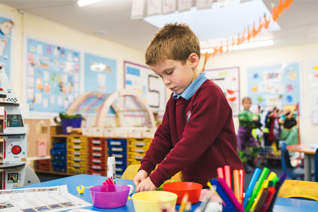 Reception pupil in classroom