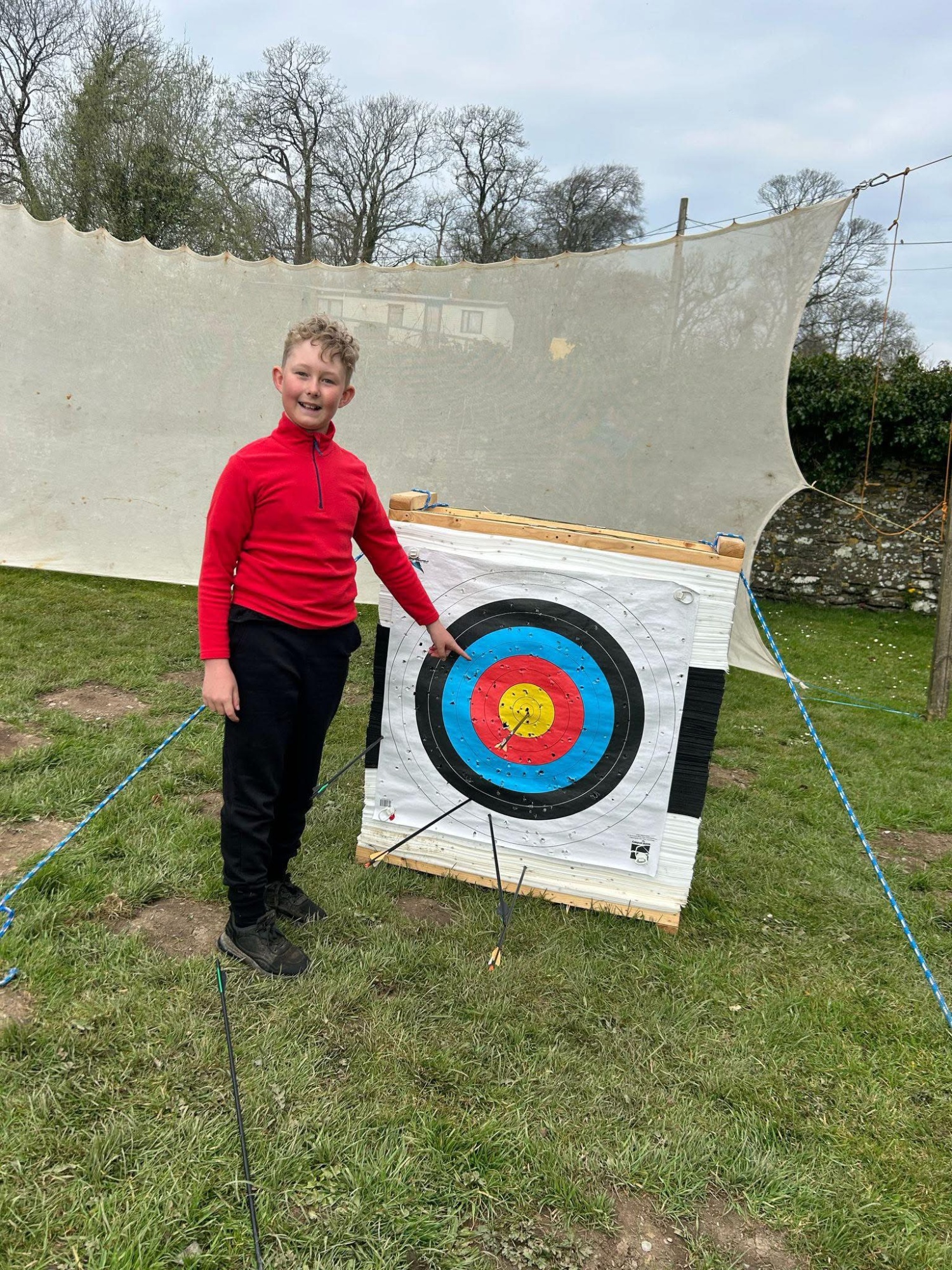 Pupil with archery target