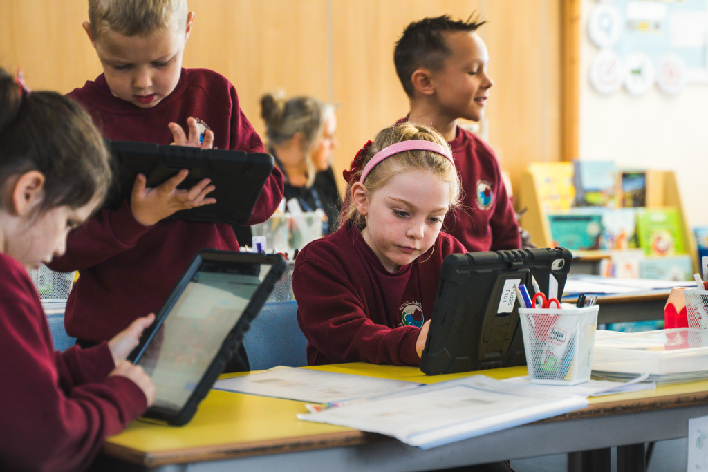Year 1/2 pupils using iPads